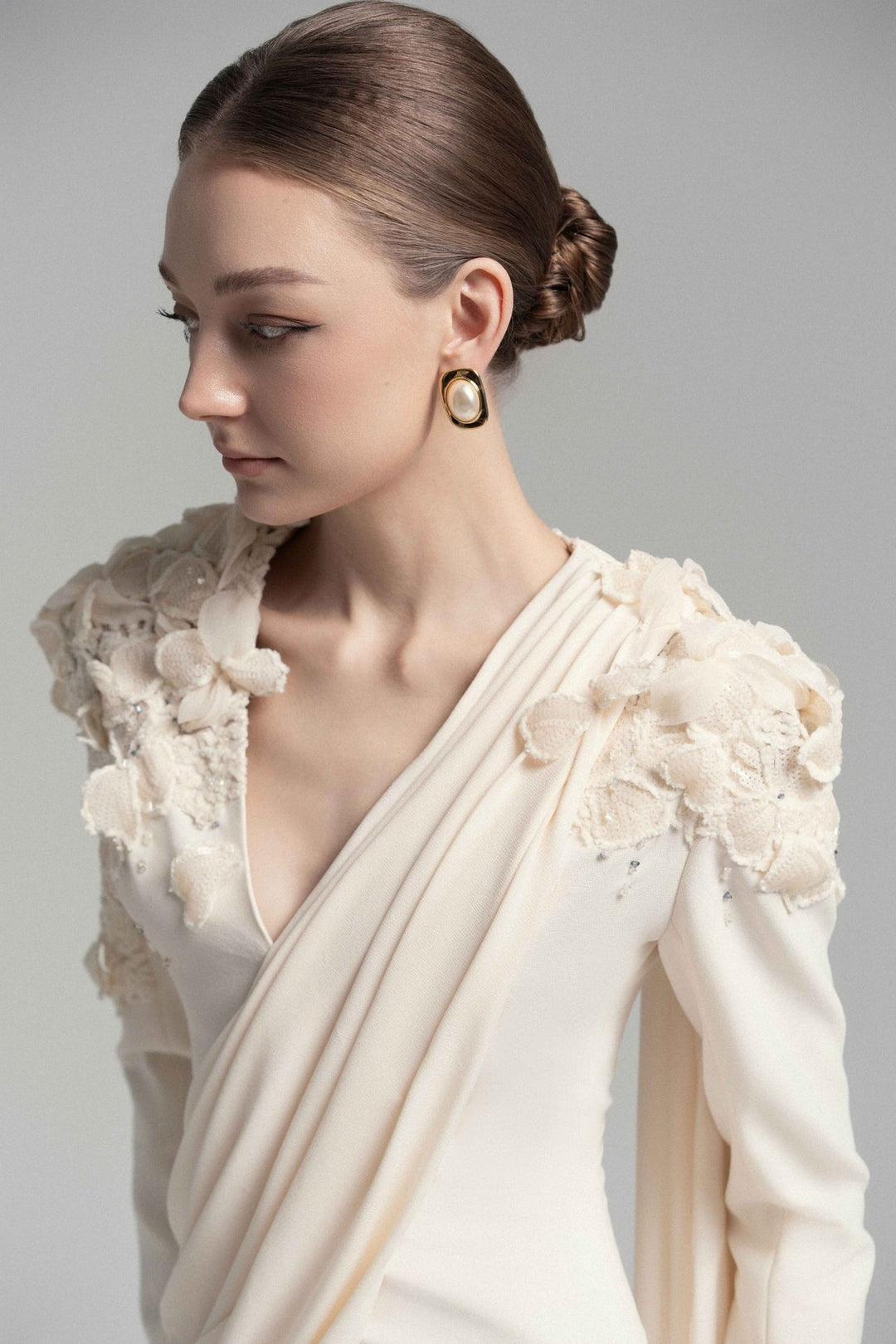 draped lace-embellished gown with floral shoulders – ODD- ELARIS