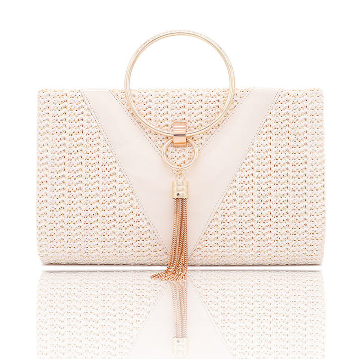 Woven handbag with gold ring handle and tassel detail - Bopi