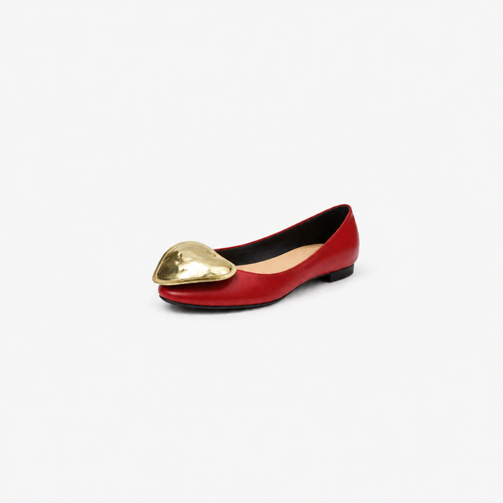 round-toe flats with oversized metallic accent – ADHAM