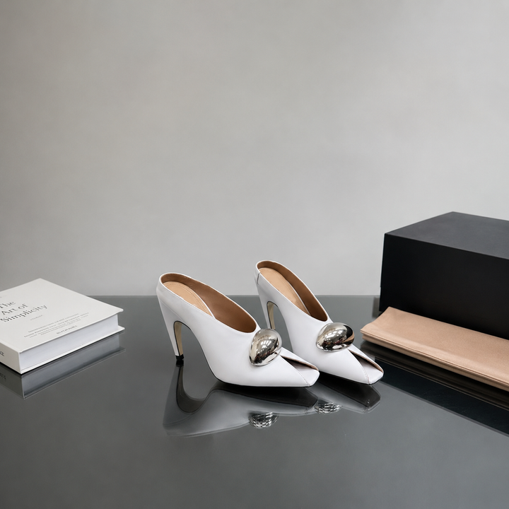 black leather mules with gold oval detail - LOMA