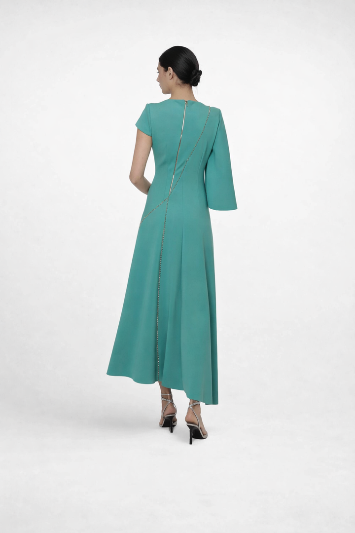 asymmetrical midi dress with cape sleeve and chain detail – EMERALD