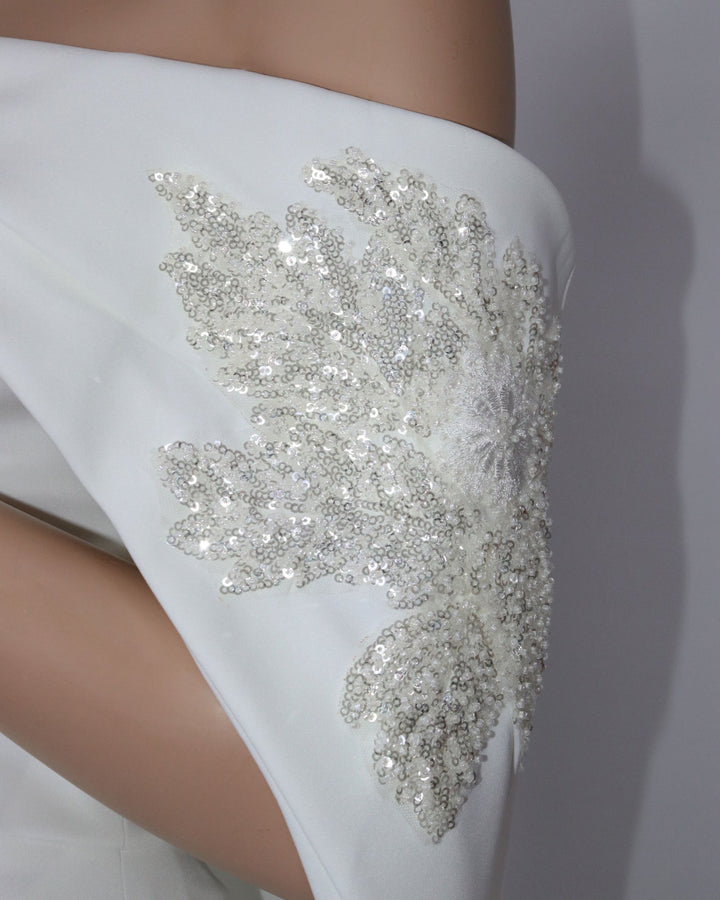 ODD-Strapless Sequined dress with a long train