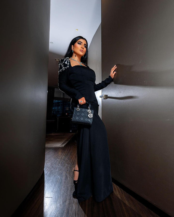 Black column dress with beaded shoulders and long sleeves ODD-Telqo