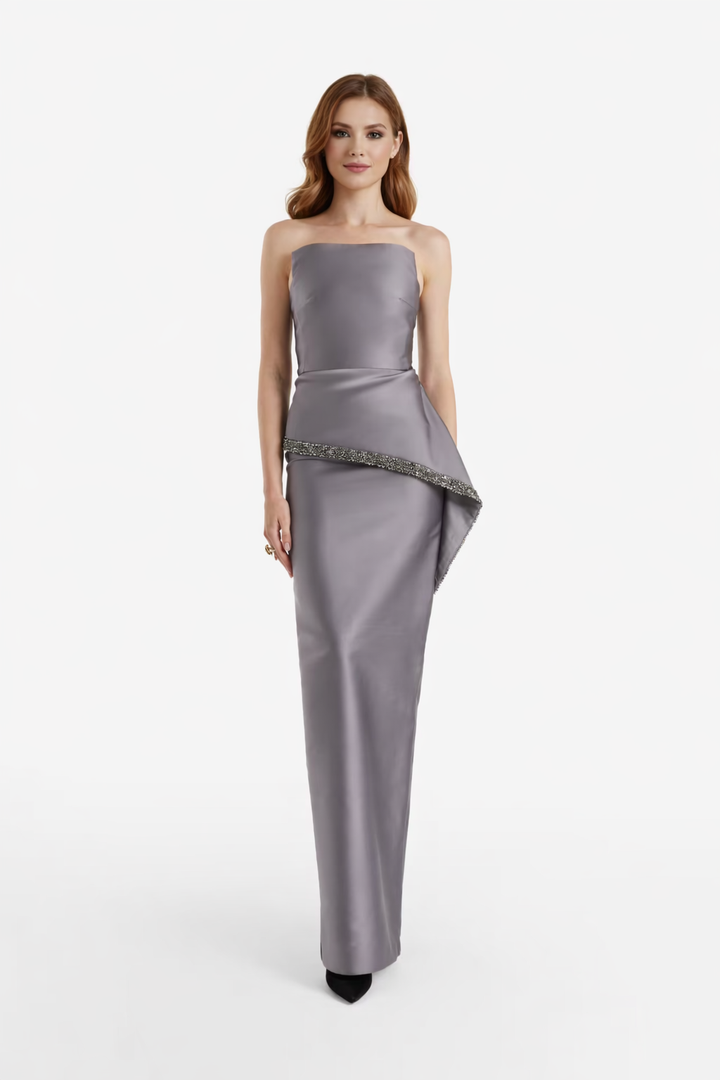strapless column gown with asymmetric embellished peplum – SILVERRA
