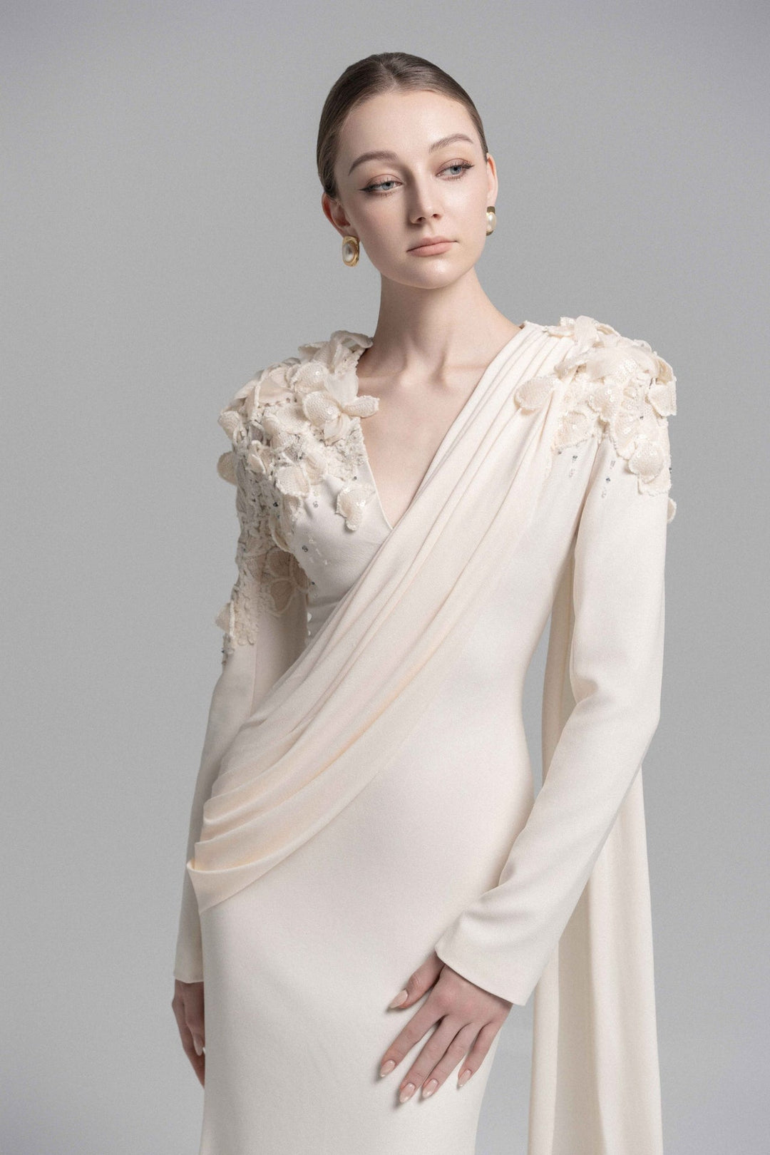 draped lace-embellished gown with floral shoulders – ODD- ELARIS