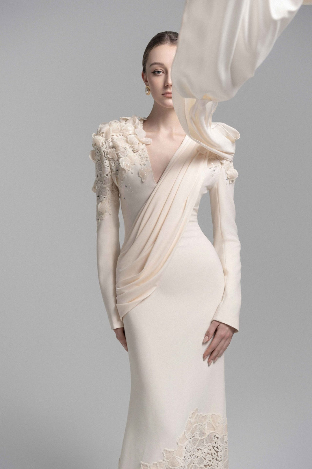 draped lace-embellished gown with floral shoulders – ODD- ELARIS