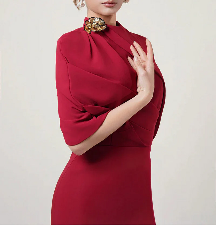 asymmetric cape gown with sculpted shoulder detail – ADRIANA