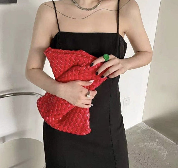 woven leather clutch with fringe detail – Aelueua