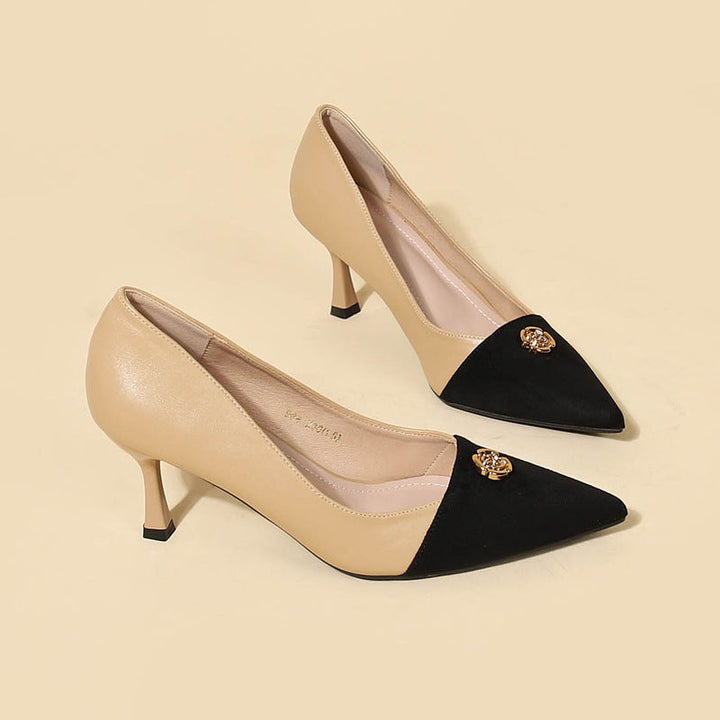 two-tone pointed toe pumps with gold emblem – ELEGANCE