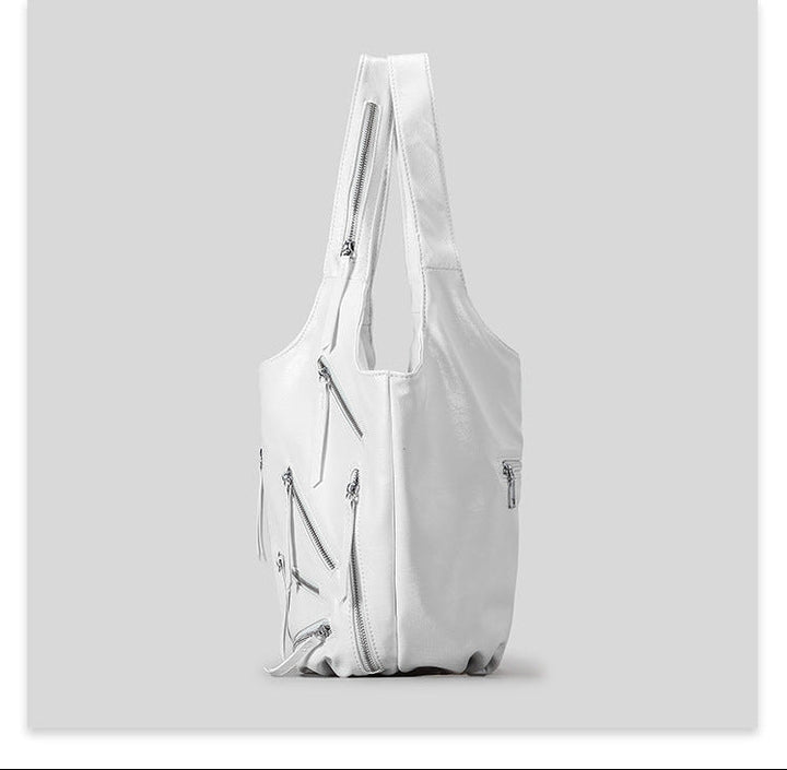 slouchy shoulder bag with multi-zipper details – EDGE