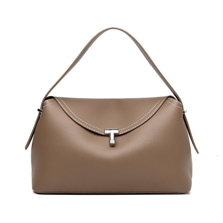 curved flap handbag with contrast stitching – TESSA