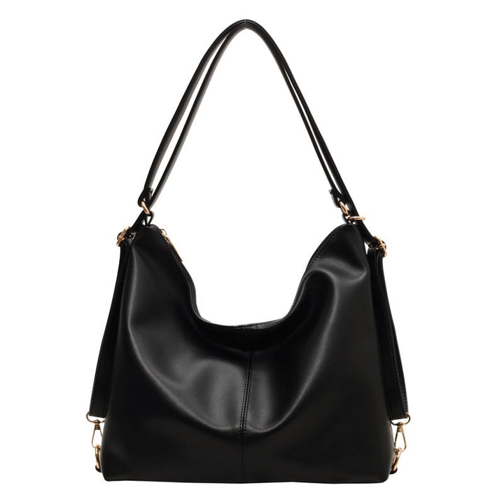 slouchy shoulder bag in black faux leather – ARYA