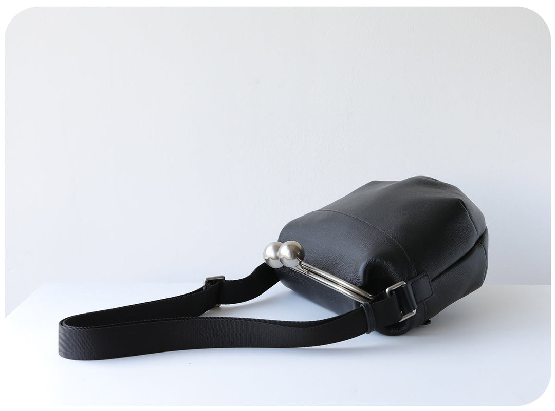 mini leather crossbody bag with metal frame clasp – YOUSF