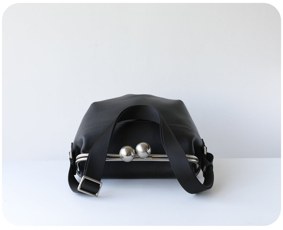 mini leather crossbody bag with metal frame clasp – YOUSF