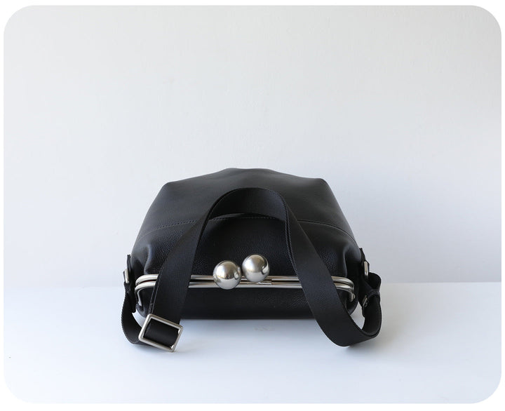 mini leather crossbody bag with metal frame clasp – YOUSF