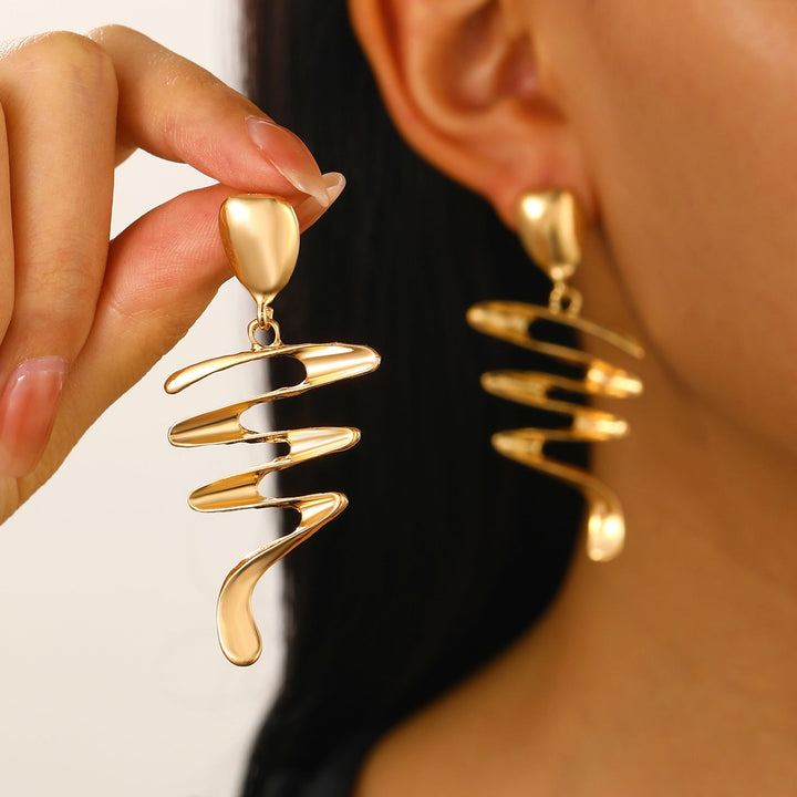 Spiral-cut drop earrings in polished gold-tone metal - Nawly