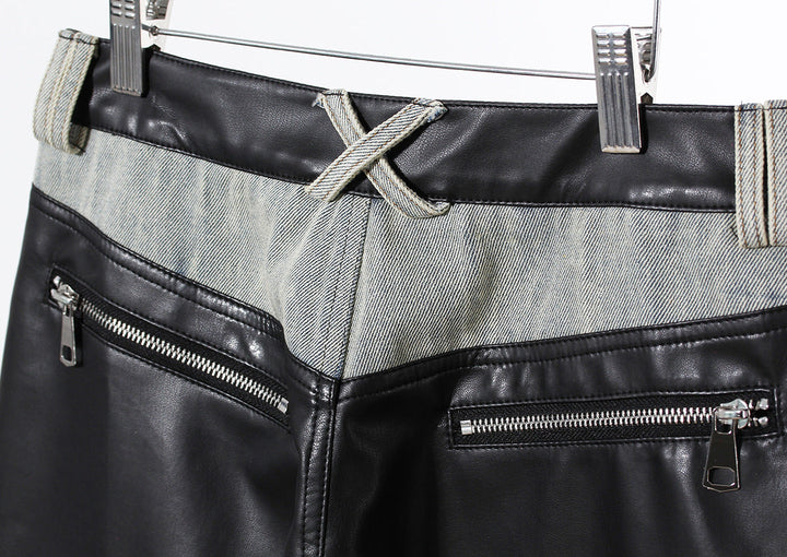 two-tone wide-leg denim pants with faux leather panels – NOIR
