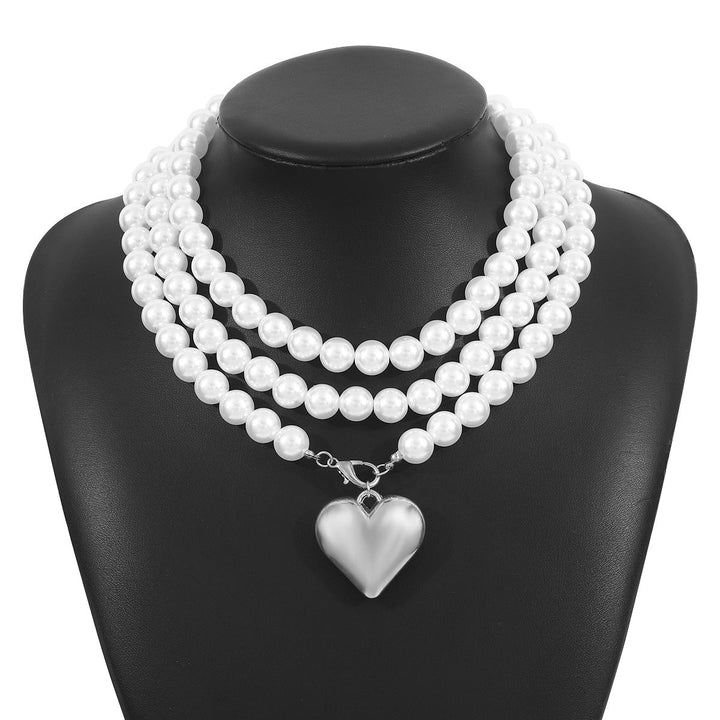 multi-strand pearl necklace with heart charm - NOELLEQ