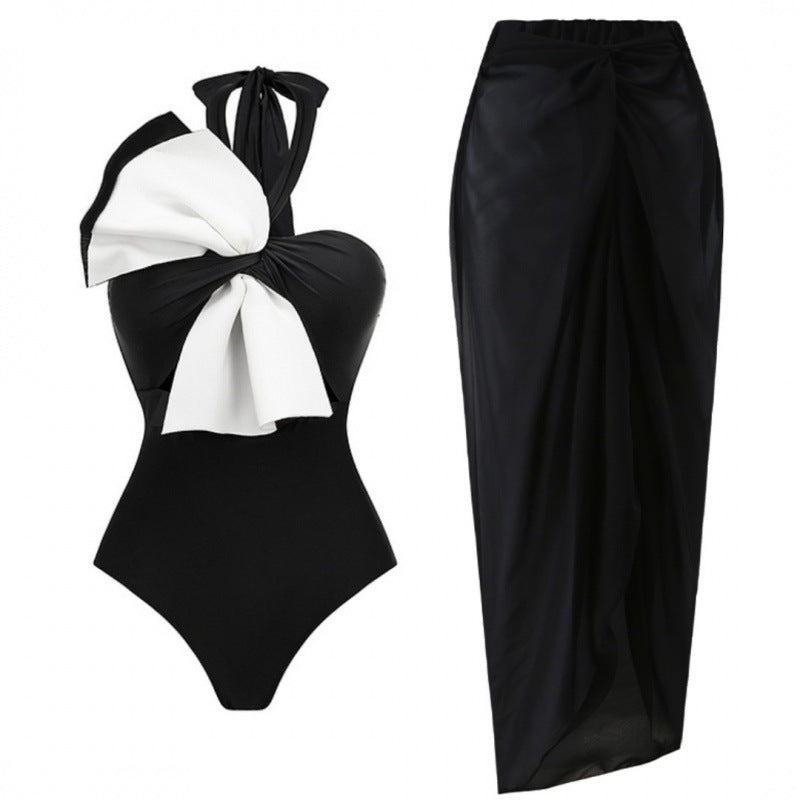 halter bow-detail swimsuit with draped wrap skirt – MUSE