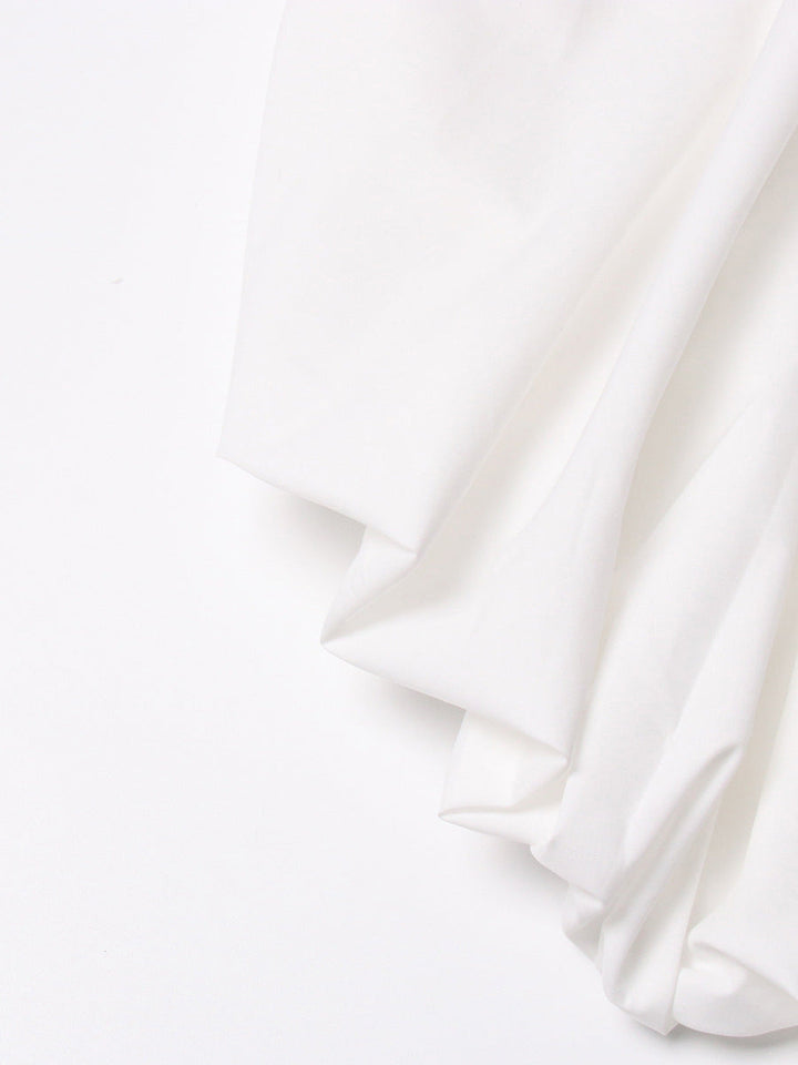long-sleeve cropped blouse with ruched hem - Fenok