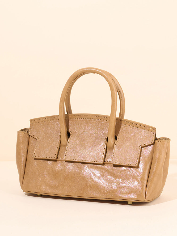 soft leather mini carryall with structured flap detail – CAMELIA