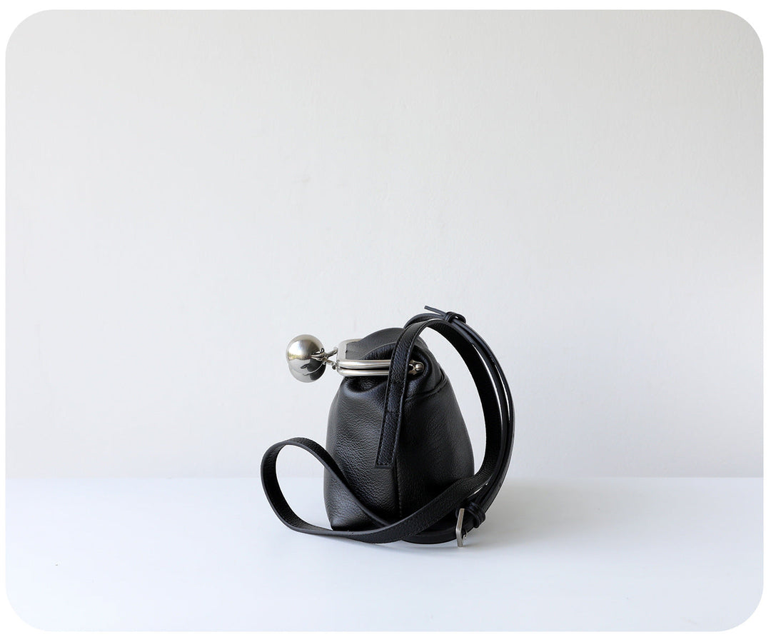 mini leather crossbody bag with metal frame clasp – YOUSF