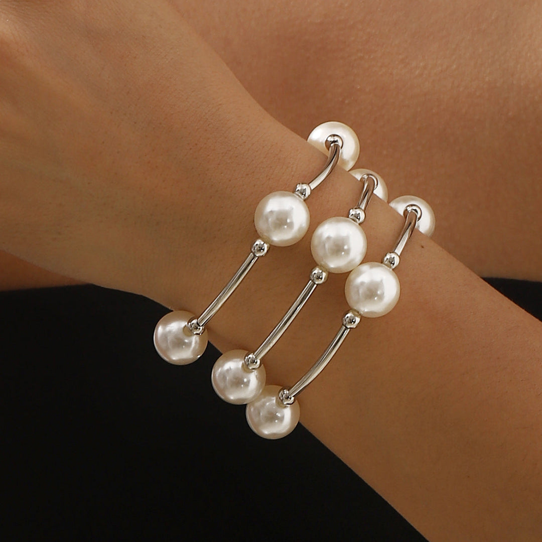 spiral cuff bracelet with oversized pearls – NOIRÉLLE