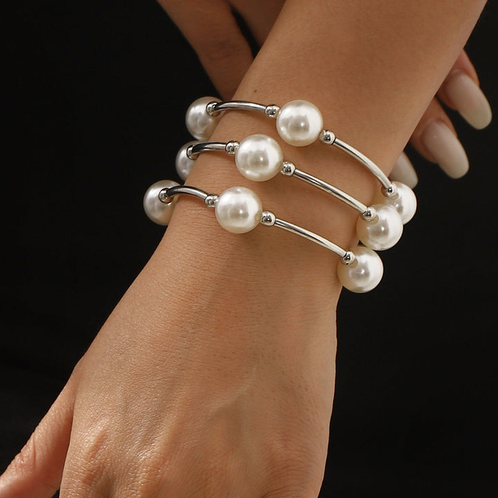 spiral cuff bracelet with oversized pearls – NOIRÉLLE
