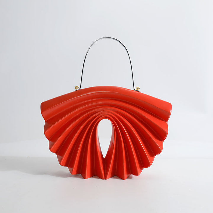 culpted accordion shell bag with metal top handle – LUCIDA
