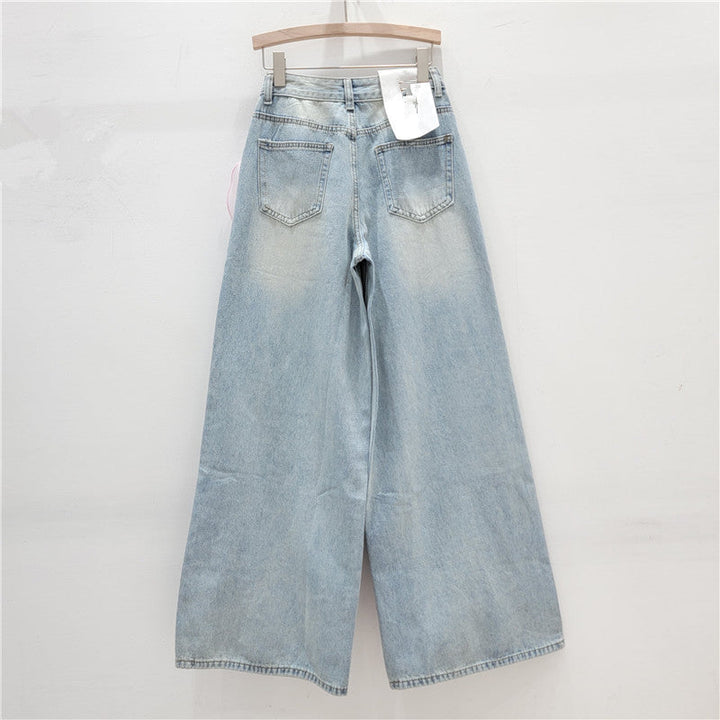 wide-leg denim pants with oversized organza floral appliqué – BLOSSOM