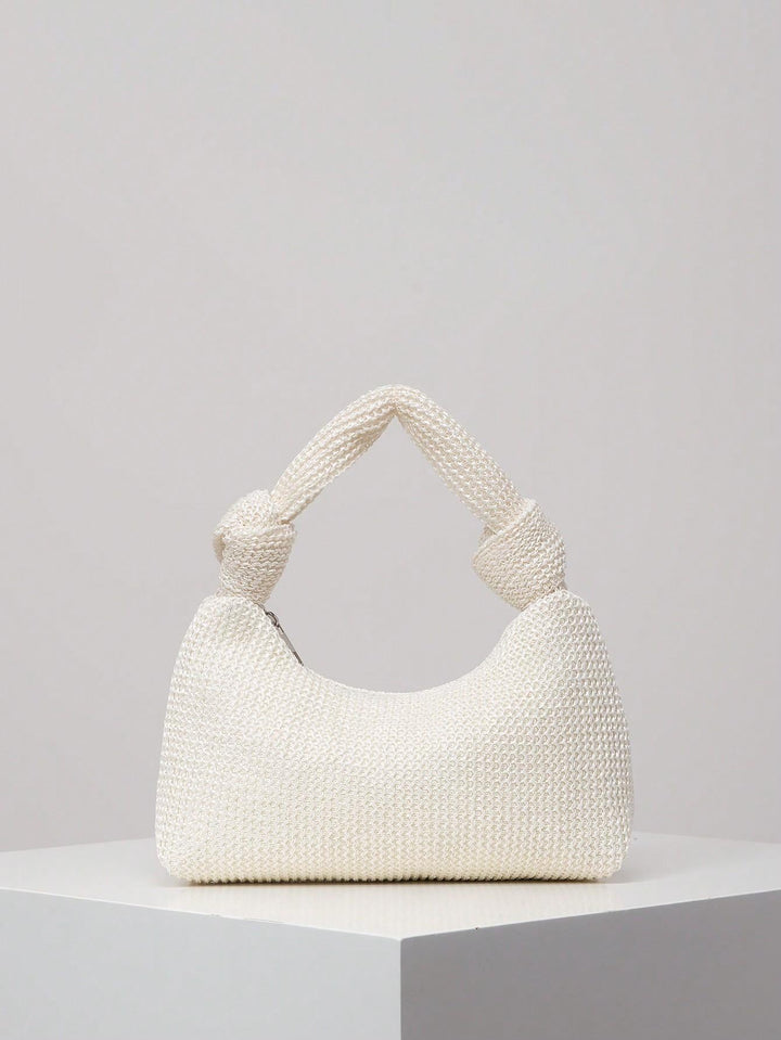 Knotted handle shoulder bag in woven cream raffia - Rutri