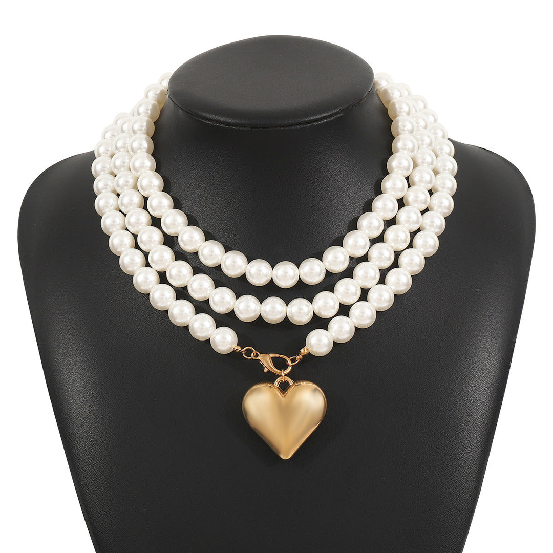 multi-strand pearl necklace with heart charm - NOELLEQ