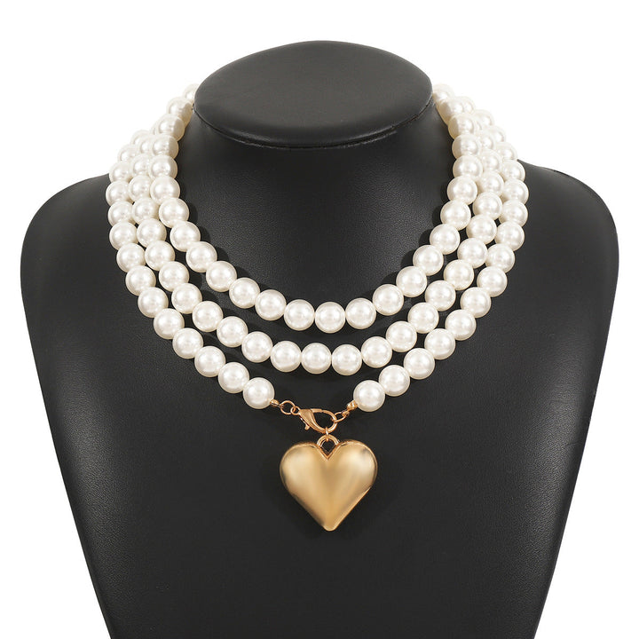 multi-strand pearl necklace with heart charm - NOELLEQ