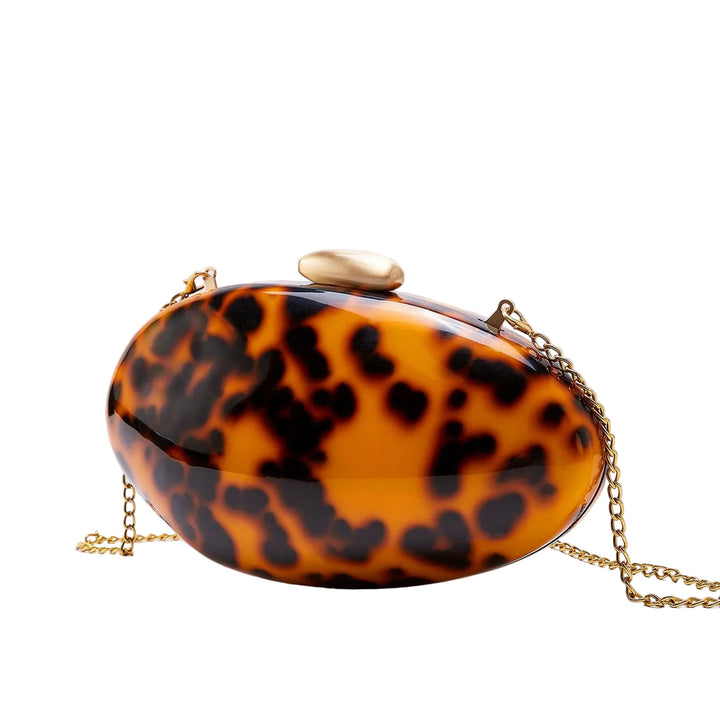 Oval tortoiseshell clutch with gold chain strap – AMBER