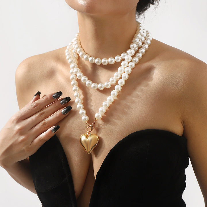 multi-strand pearl necklace with heart charm - NOELLEQ
