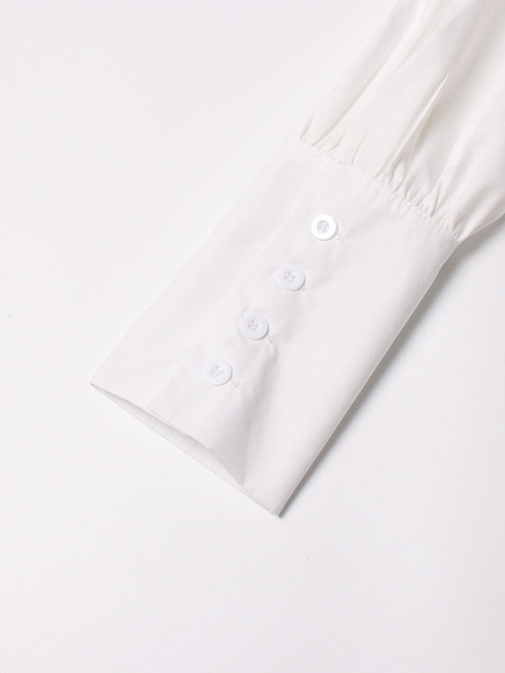 long-sleeve cropped blouse with ruched hem - Fenok
