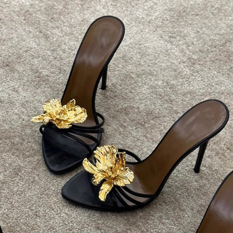 black stiletto mules with gold sculpted flower – CALISTA