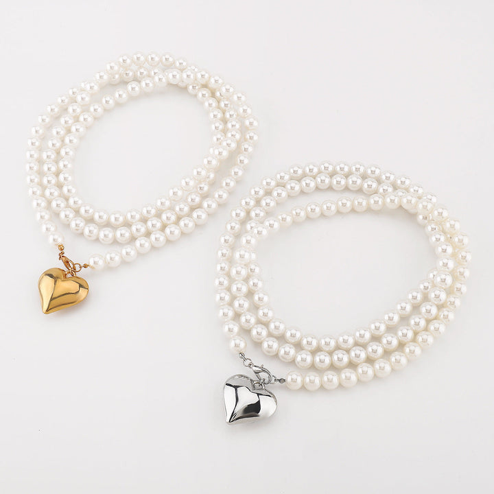 multi-strand pearl necklace with heart charm - NOELLEQ