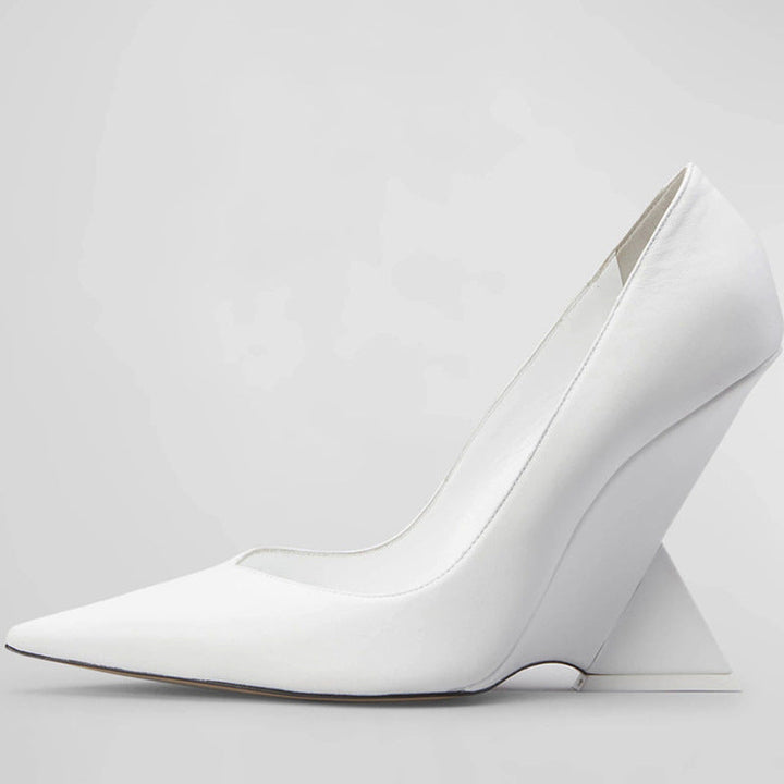 pointed-toe patent pumps with sculpted geometric heel – RUBY