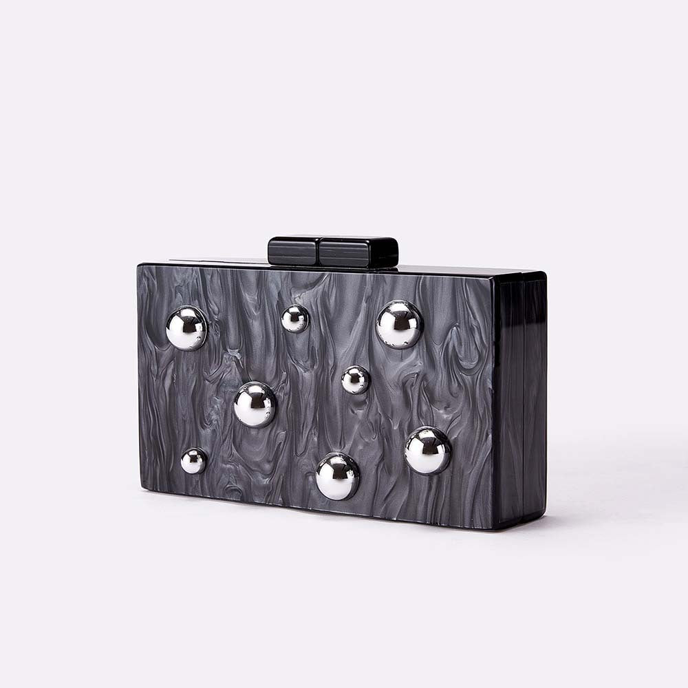 Tortoiseshell box clutch with gold stud accents – BASMA