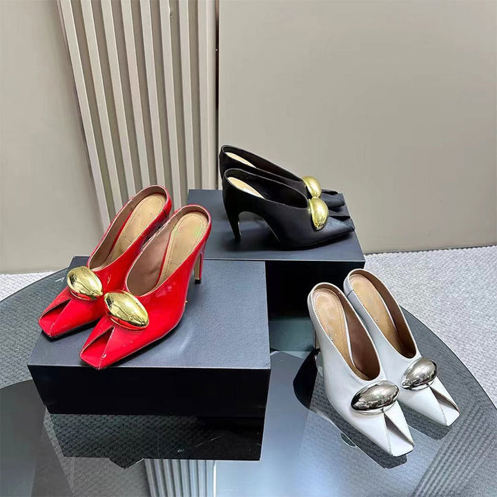 black leather mules with gold oval detail - LOMA