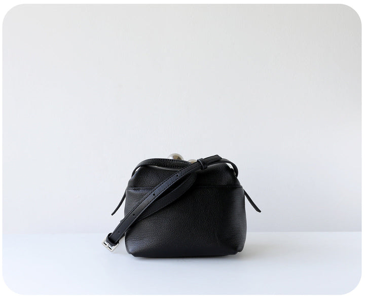 mini leather crossbody bag with metal frame clasp – YOUSF