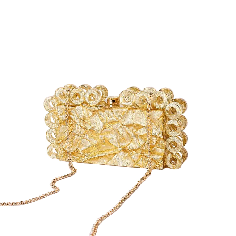 textured gold clutch with circular edge detailing – AURELIA