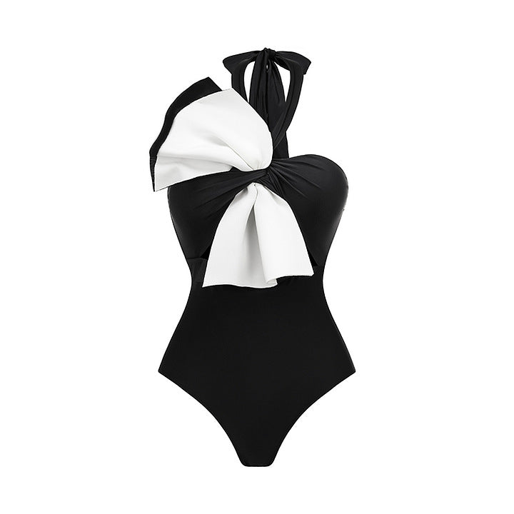 halter bow-detail swimsuit with draped wrap skirt – MUSE