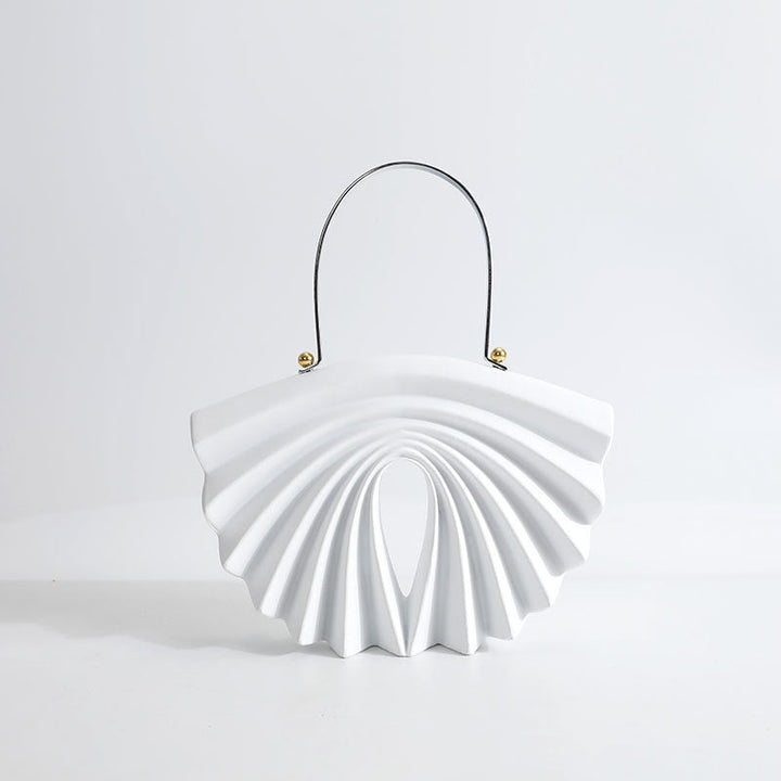 culpted accordion shell bag with metal top handle – LUCIDA