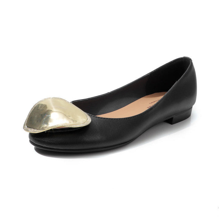 round-toe flats with oversized metallic accent – ADHAM