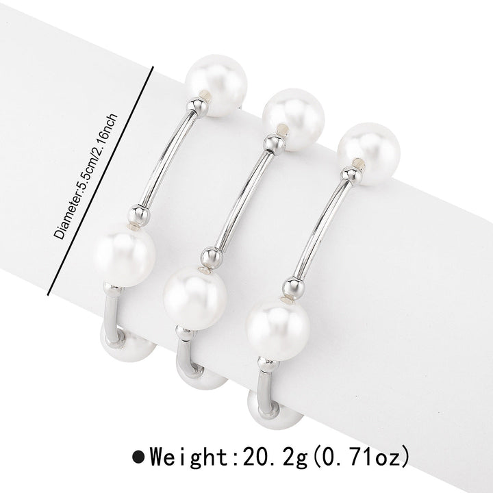 spiral cuff bracelet with oversized pearls – NOIRÉLLE