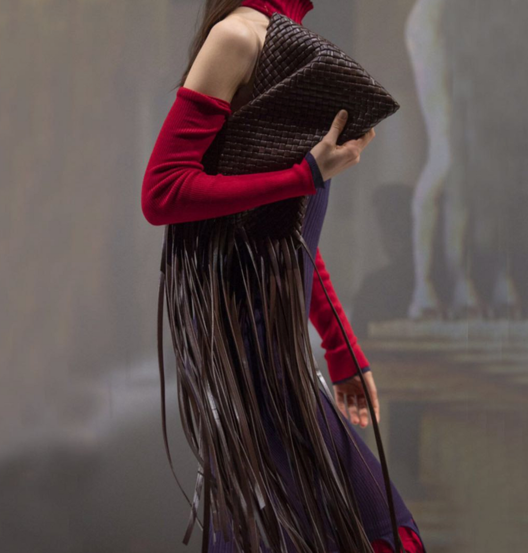 woven leather clutch with fringe detail – Aelueua