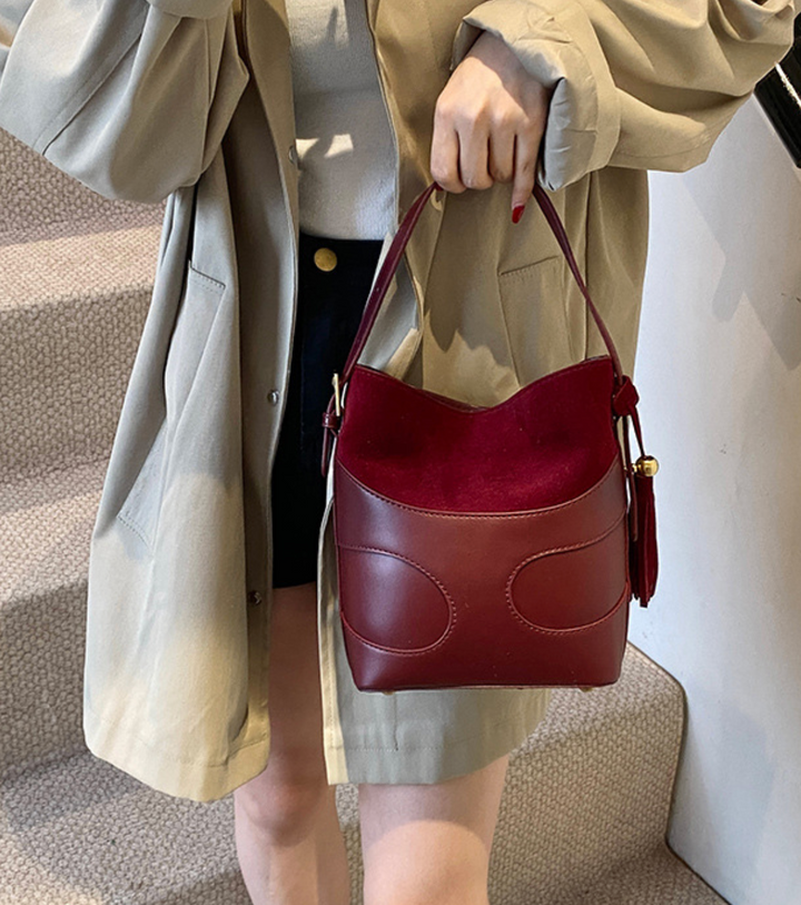 suede bucket bag with curved leather trim – RUBY