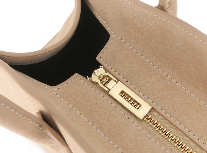sleek half-moon leather tote with elongated handles – VELORA